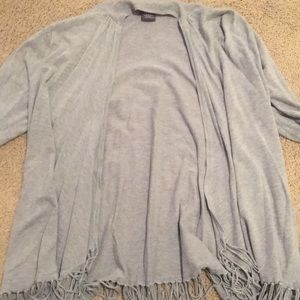 light grey cardigan with fringe at the bottom